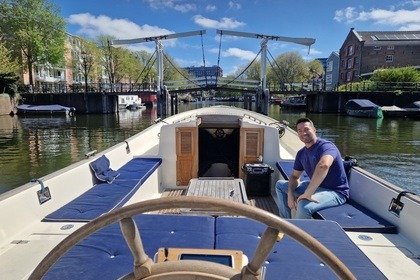 Verhuur Motorboot Jan van Gent Sloep 10m Zaandam