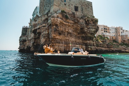 Rental Motorboat Invictus Yacht Elegant tour with Champagne Polignano a Mare